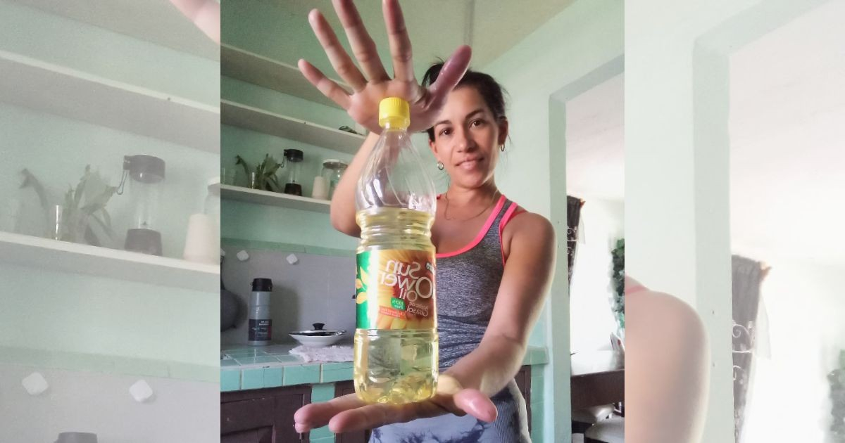 «Tengo oro en las manos»: madre cubana posa con un pomo de aceite y captura la crisis que vive la isla